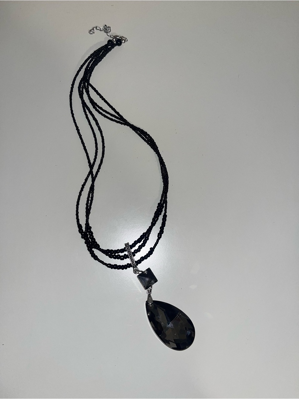 Black multi-strand beaded ball necklace